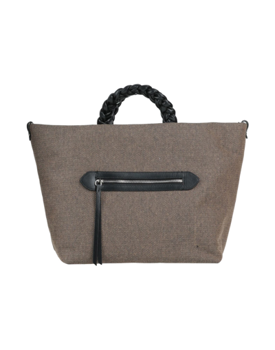 Shop Innue' Handbags In Camel