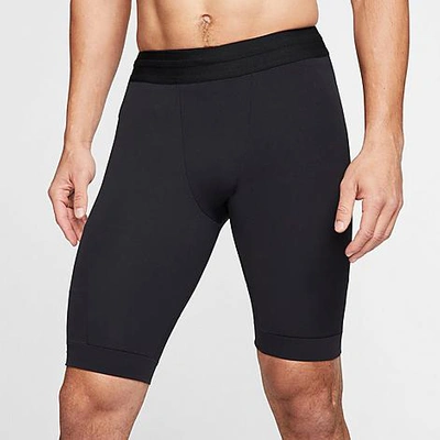Shop Nike Men's Yoga Dri-fit Shorts In Black/iron Grey