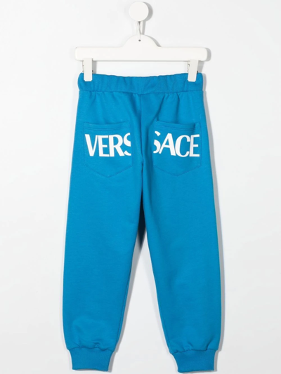 Shop Versace Greca Print Track Pants In Blue