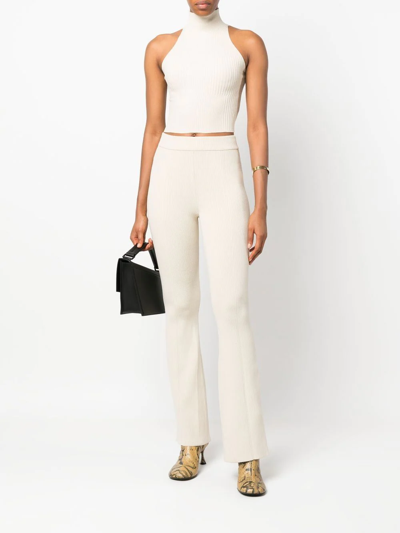 Aeron Ribbed-knit Flared Trousers In Neutrals