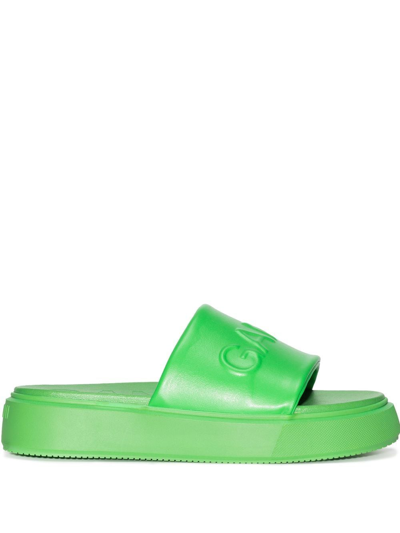 Shop Ganni Logo-embossed Slide Sandals In Grün