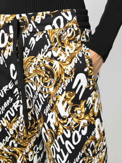 Shop Versace Jeans Couture Monogram-print Track-pants In Schwarz