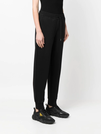 Shop Moncler Logo-patch Track Pants In Schwarz