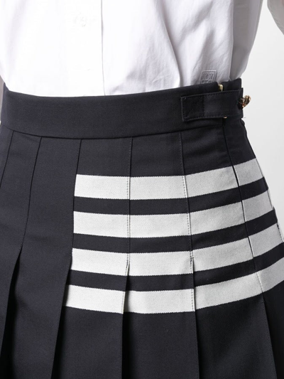 Shop Thom Browne Women Mini Dropped Back Pleated Skirt In Engineered 4 Bar Plain Weave Suiting In 415 Navy