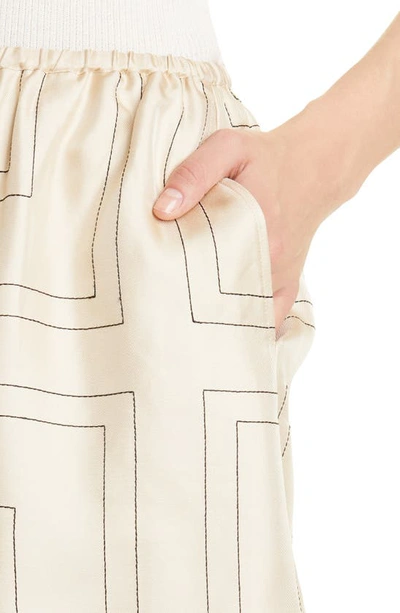 Shop Totême Monogram Pull-on Silk Shorts In Ivory Monogram