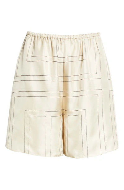 Shop Totême Monogram Pull-on Silk Shorts In Ivory Monogram