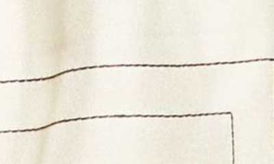 Shop Totême Monogram Pull-on Silk Shorts In Ivory Monogram