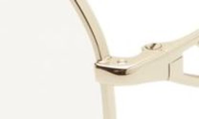Prada 57mm Irregular Sunglasses In Pale Gold