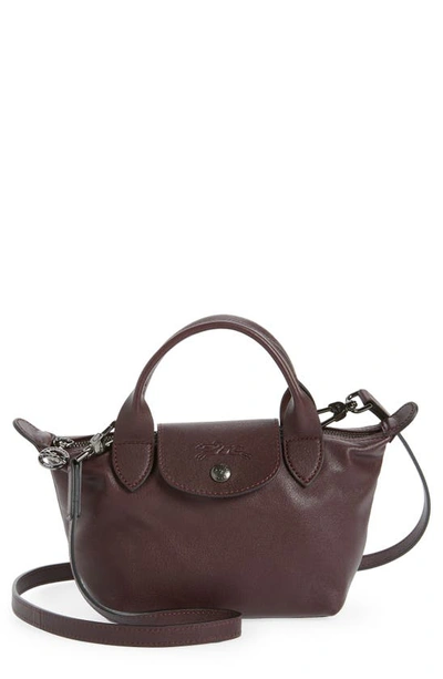 Shop Longchamp Mini Le Pliage Cuir Leather Top Handle Bag In Burgundy