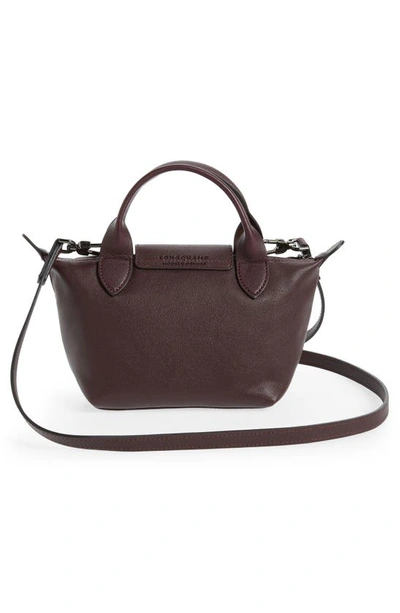Shop Longchamp Mini Le Pliage Cuir Leather Top Handle Bag In Burgundy