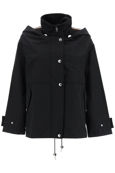 Shop Burberry Hooded Hybrid Jacket In Black