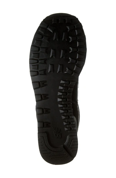 Shop New Balance 574 Classic Sneaker In Black/ Tan