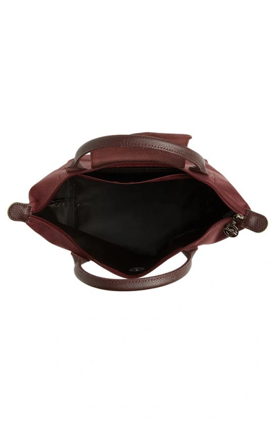 Shop Longchamp Small Le Pliage Travel Bag In Burgundy