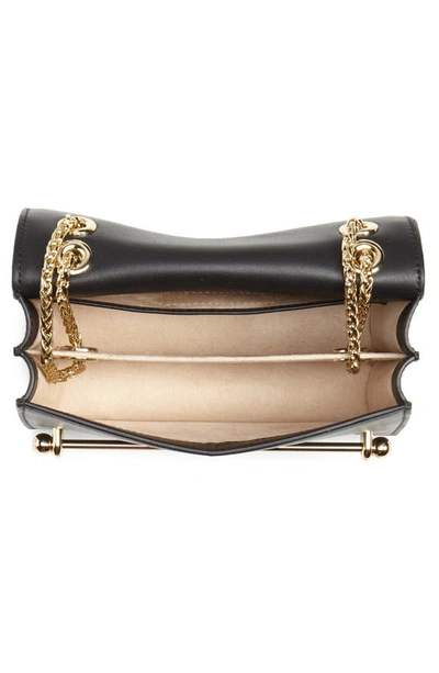 Shop Strathberry Mini East/west Leather Crossbody Bag In Black