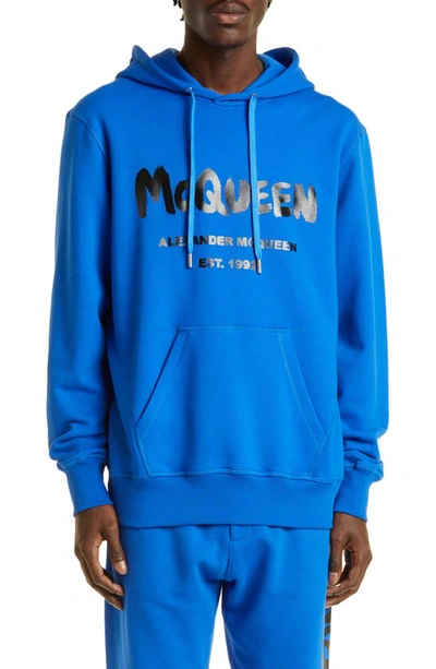 Shop Alexander Mcqueen Graffiti Logo Cotton Graphic Hoodie In Royal Blue/ Black