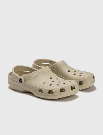 Shop Crocs Classic Clog In Beige