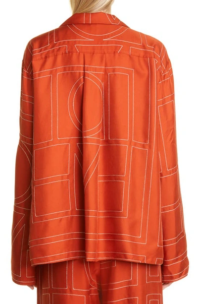 Shop Totême Monogram Silk Pajama Top In Bloody Mary