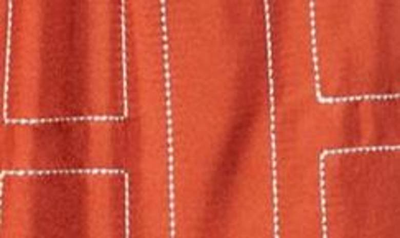 Shop Totême Monogram Silk Pajama Bottoms In Bloody Mary