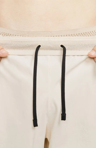 Shop Nike 3-in-1 Shorts, Belt & Towel Set In Flat Opal/ Desert Ore
