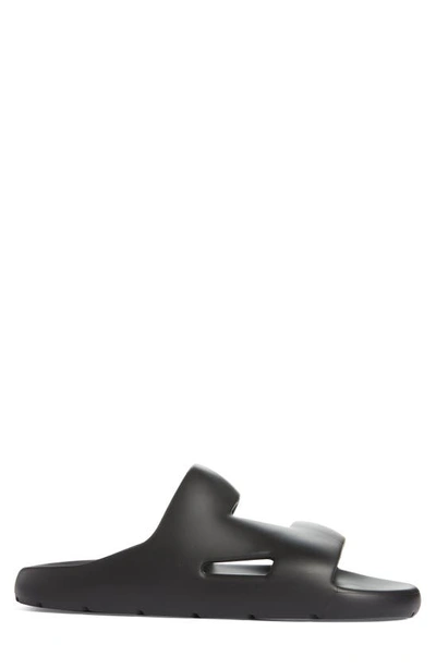 Shop Bottega Veneta Gel Rubber Slide Sandal In Black
