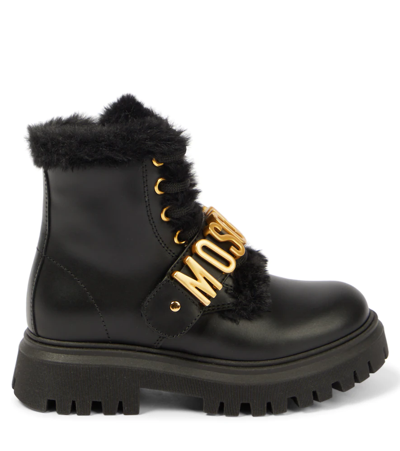 Shop Moschino Logo Leather Boots In Black / Gold