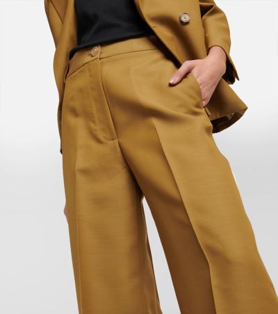 Shop Khaite Ian Low-rise Wide-leg Pants In Khaki