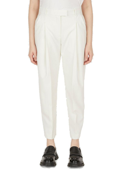 Shop Alexander Mcqueen Pleated Tailored Trousers In White