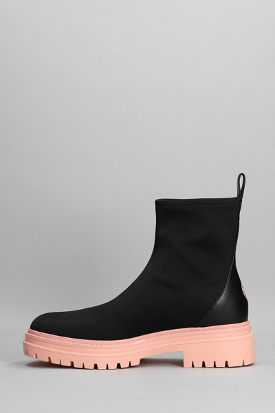 Shop Michael Kors Comet Lug Low Heels Ankle Boots In Black Synthetic Fibers
