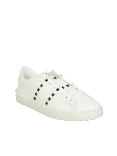 Shop Valentino Garavani  Garavani  Rockstud Untitled Sneakers Are A Timeless Accessory, Adorned  In White