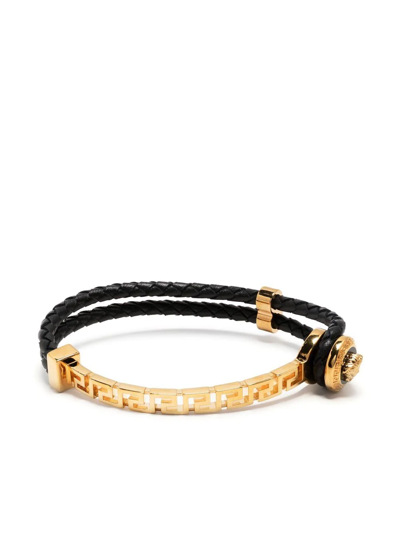 Shop Versace Greca Braided Leather Bracelet In Gold