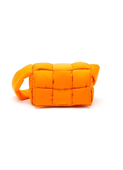 Shop Bottega Veneta Woven Padded Nylon Messenger Bag In Orange