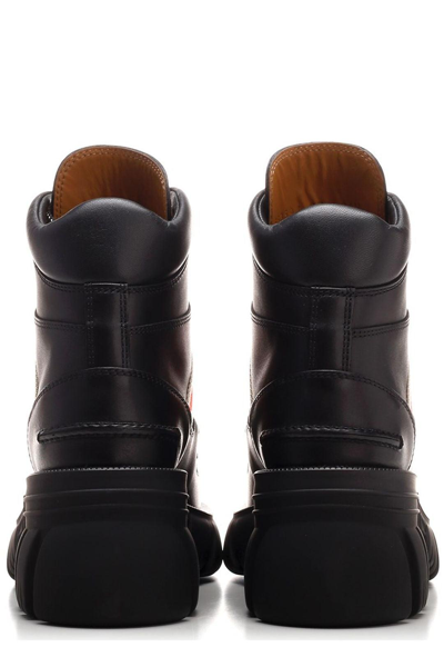 Shop Gucci Interlocking G Ankle Boots