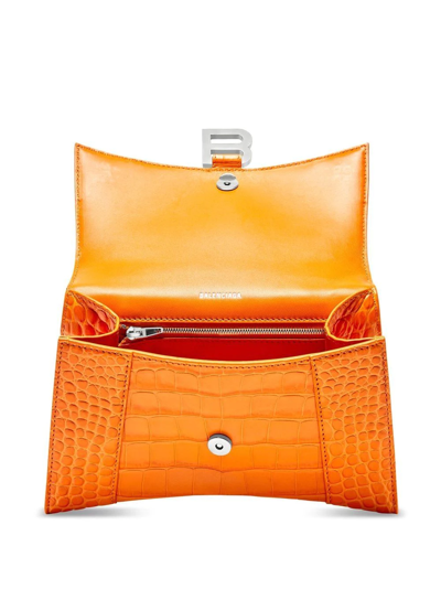 Shop Balenciaga Small Hourglass Top-handle Bag In Orange