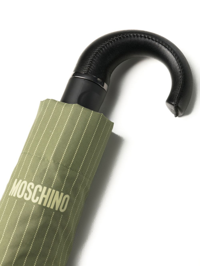 Shop Moschino Logo-print Umbrella In Grün