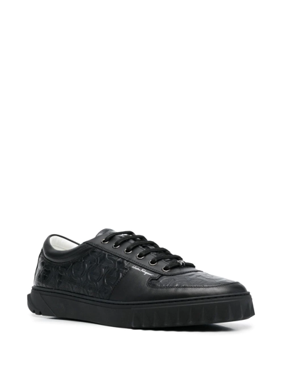 Shop Ferragamo Gancini-embossed Leather Sneakers In Black