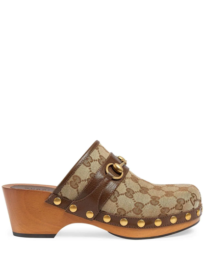 Shop Gucci Gg Supreme Horsebit Clogs In Brown