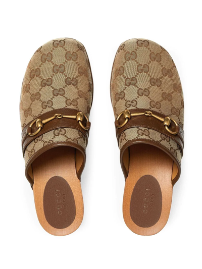 Shop Gucci Gg Supreme Horsebit Clogs In Brown