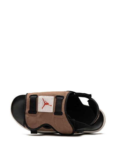 Shop Jordan Ls Slides In Brown