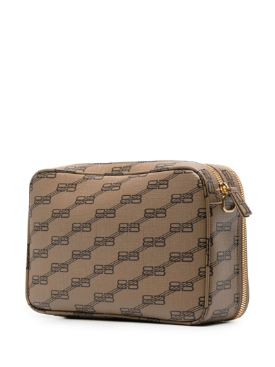 Shop Balenciaga Bb-print Leather Clutch Bag In 褐色