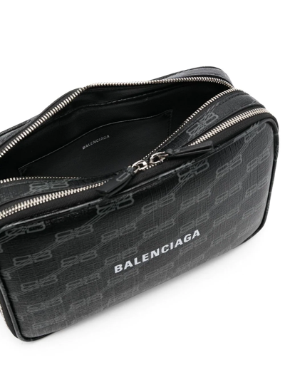 Shop Balenciaga Everyday Pouch Bag In 黑色