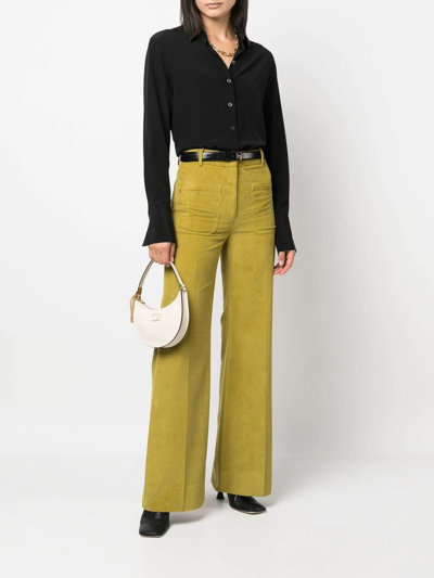 Shop Victoria Beckham Alina Corduroy Wide-leg Trousers In 绿色