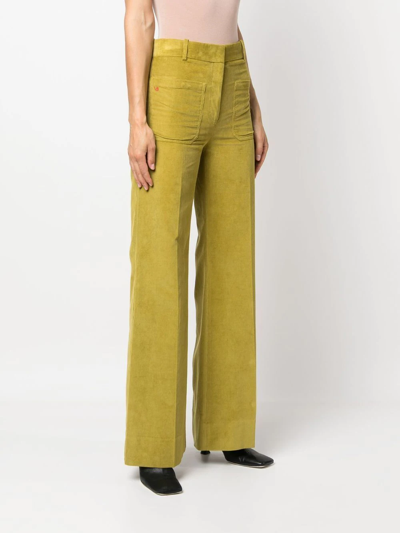 Shop Victoria Beckham Alina Corduroy Wide-leg Trousers In 绿色