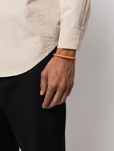 Shop Ferragamo Woven-leather Bracelet In 橘色