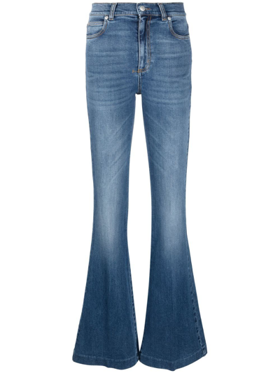 Shop Alexander Mcqueen Logo-patch Denim Jeans In Blue