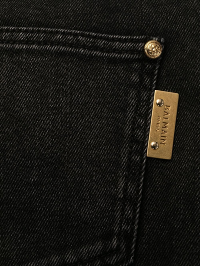 Shop Balmain Logo-plaque Denim Jeans In 黑色