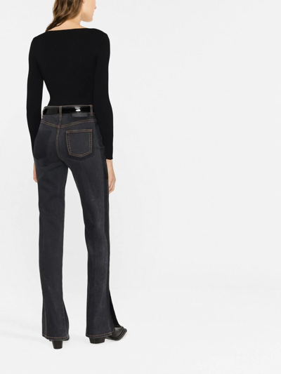 Shop Alexander Mcqueen Logo-patch Bootcut Jeans In Black