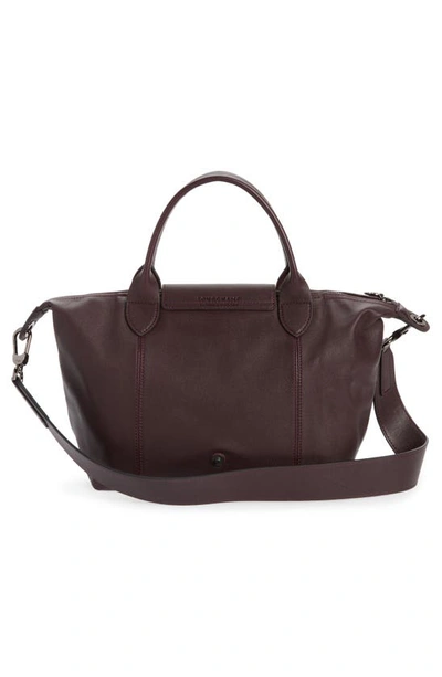 Shop Longchamp Small Le Pliage Cuir Leather Top Handle Bag In Burgundy