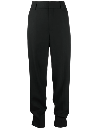 Shop Ganni Tapered Cuff Tailored Trousers In Black