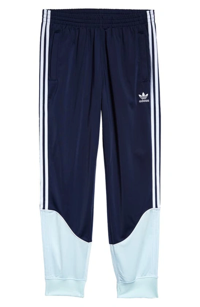 Shop Adidas Originals Sst Tricot Track Pants In Navy/ Blue/ White