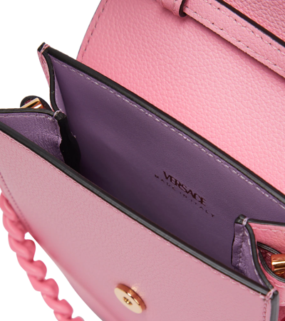 Shop Versace La Medusa Leather Phone Pouch In Baby Pink-baby Pink- Go